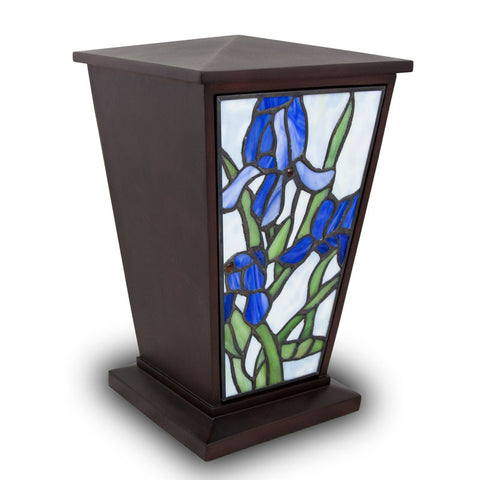 Stained glass urn for ashes with blue iris depicted on front of urn, perfect for up to two-hundred cubic inches of ash.