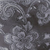 Black floral print with light grey background as seen on the urn.