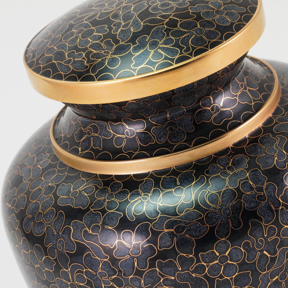 Stunning Black, grey, and onyx cloisonne cremation urn featuring a floral motif with gold accents, detail image. 