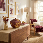 Burgundy Orchid resin Cremation Urn - Large in a home decor setting.