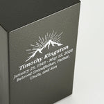 A bold steel urn box with antique bronze powder coat textured finish close up image of personalization.