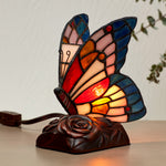Stained glass and resin butterfly cremation keepsake and memory lamp lifestyle.