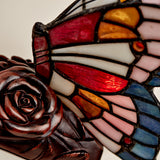 Stained glass and resin butterfly cremation keepsake and memory lamp close up.
