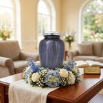 Large Enamel Finished Metal Alloy Cremation Urn - Dark Blue in a funeral service setting.