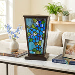 Blue Forget-Me-Not Stained Glass Cremation Urn in a home decor setting on a table.