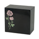 Black, natural marble urn featuring shimmering pink roses main image.