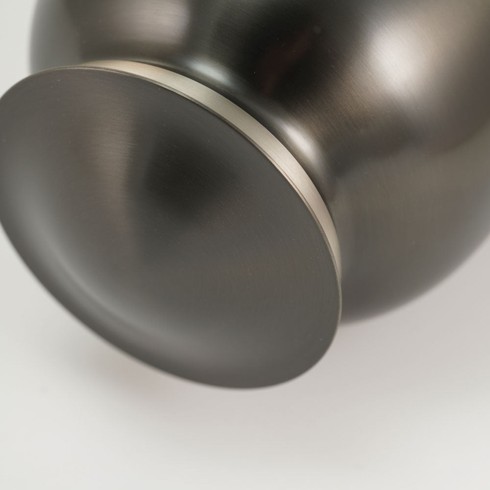 Classic slate metal cremation urn detail image.