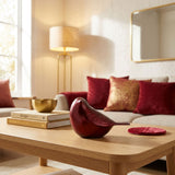 Cardinal brass songbird cremation keepsake in a home decor setting.