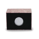 Pink, burgundy, and white natural marble box cremation urn closure image.