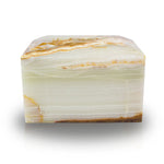 Natural marble cremation box urn in cream with golden veining front image.