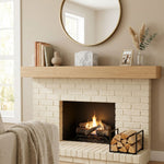 Natural white marble box  with grey veining in a home decor setting above a fireplace.