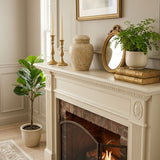 Beige natural marble urn with unique brown, white, and tan veining in a home decor setting.