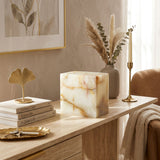 Cream & green natural marble urn with unique brown veining in a home decor setting.