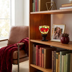 Red Rose Memory Lamp stained-glass cremation keepsake in a home decor setting on a bookshelf.