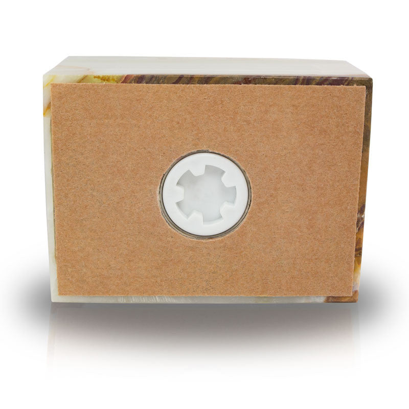 Natural marble cremation box urn in cream with golden veining bottom of urn, showing the closure