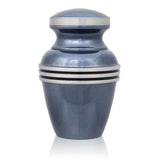 Light blue small keepsake urn for up to three cubic inches of ash with metallic blue finish and pewter colored trim and bands.