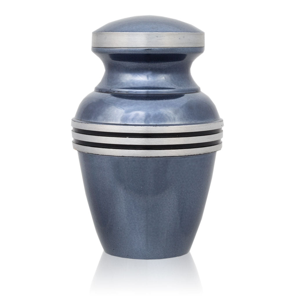 Light blue keepsake urn for up to three cubic inches of ash with metallic blue finish and pewter colored trim and bands.