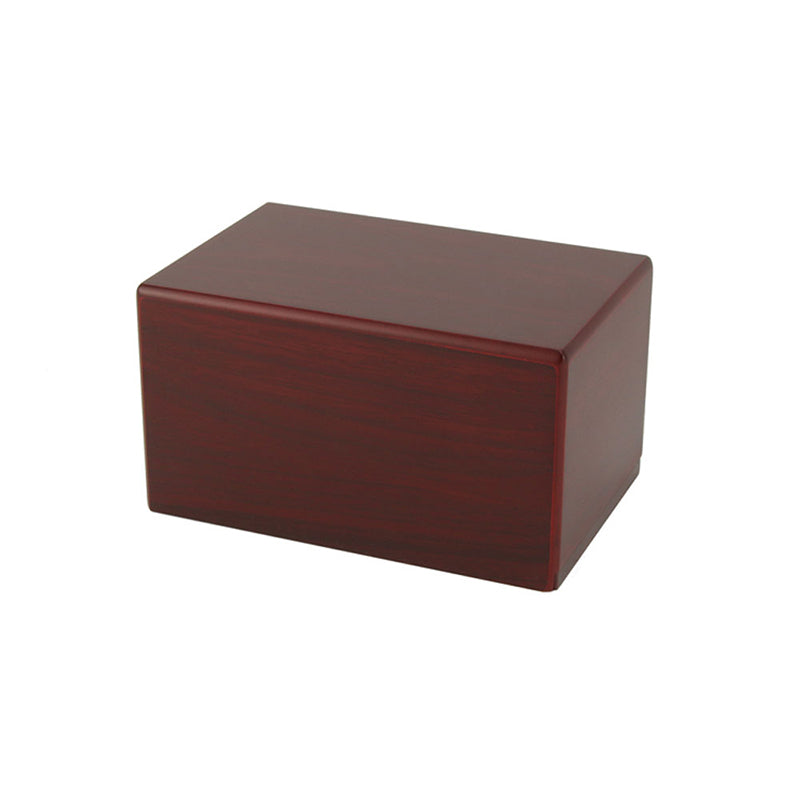 Beautiful reddish brown cherry wood finish cremation urn box for pets with capacity for up to 85 cubic inches.