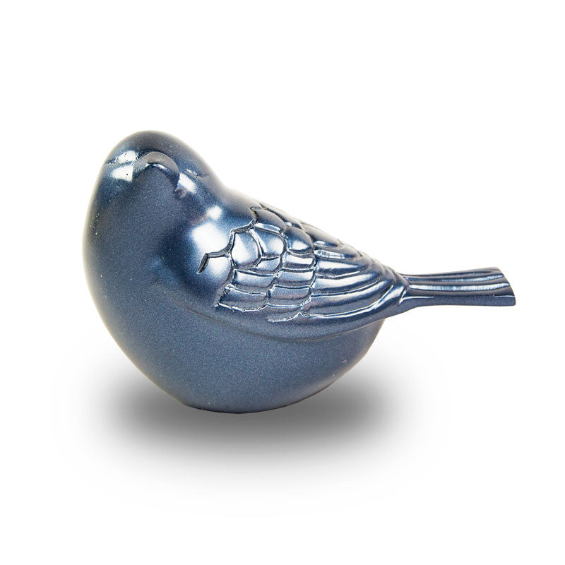 Light blue cremation keepsake for ashes in the shape of a song bird.