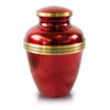 Red urn with metallic finish and three golden colored bands around the outside of the item.