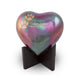 Raku heart for cremation ashes with beautiful green, pink, and purple shimmering finish with copper paw prints main image.
