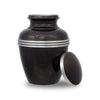 Black urn for up to eighty-five cubic inches of ash with threaded lid removed and leaning against side of urn.