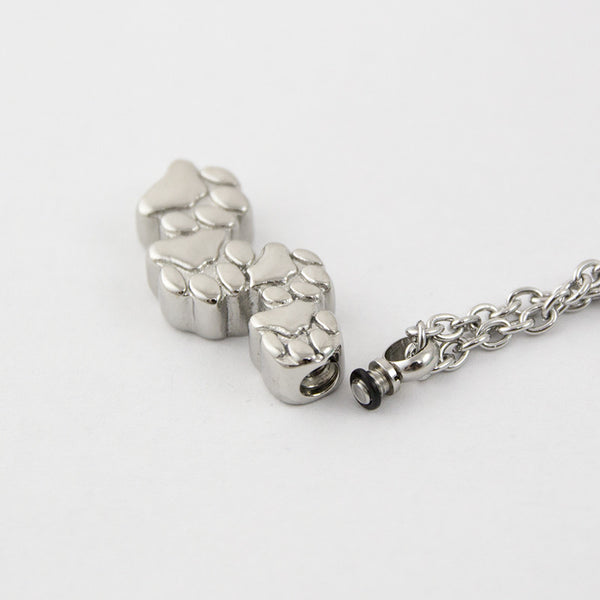 Stainless Steel Cremation Necklace With Paw Prints | Oneworld Memorials